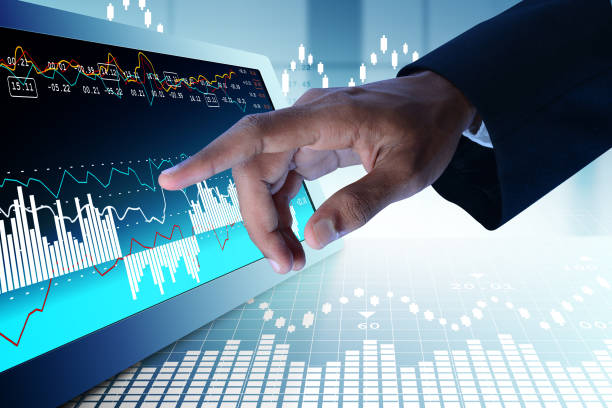 Business man touching the stock chart stock photo