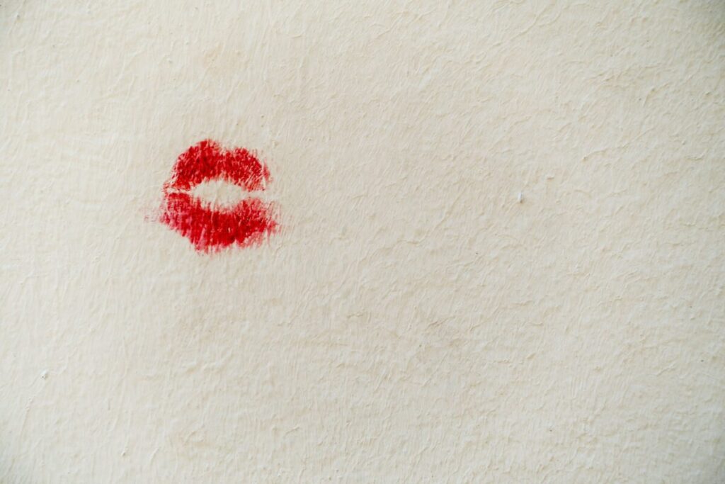 red stain on white wall
