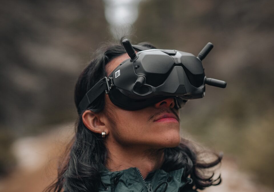 woman in black leather jacket wearing black sunglasses