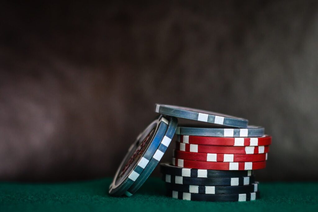selective focus photo of poker chips