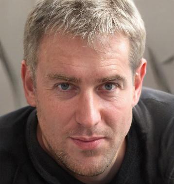 A picture containing person, person, indoor, older Description automatically generated